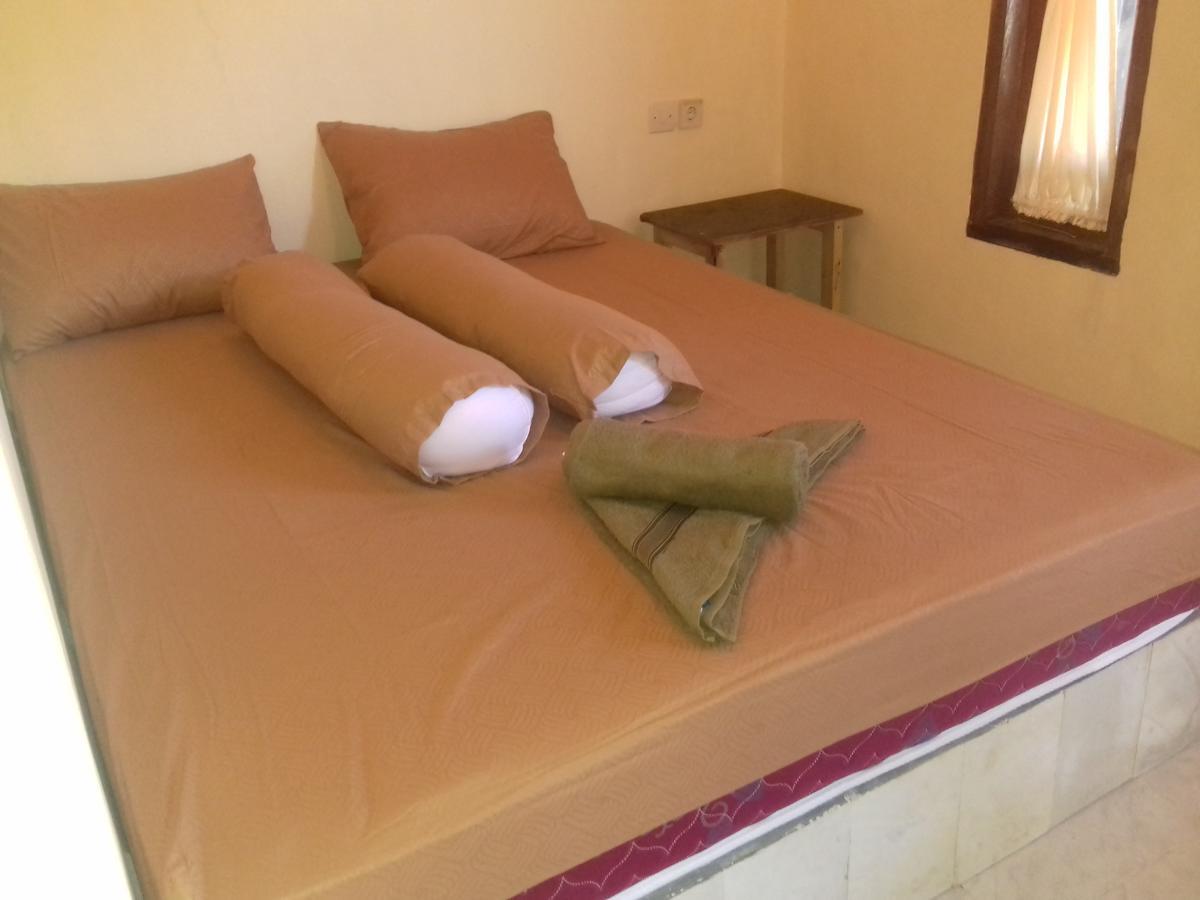Telage Indah Homestay Kuta  エクステリア 写真